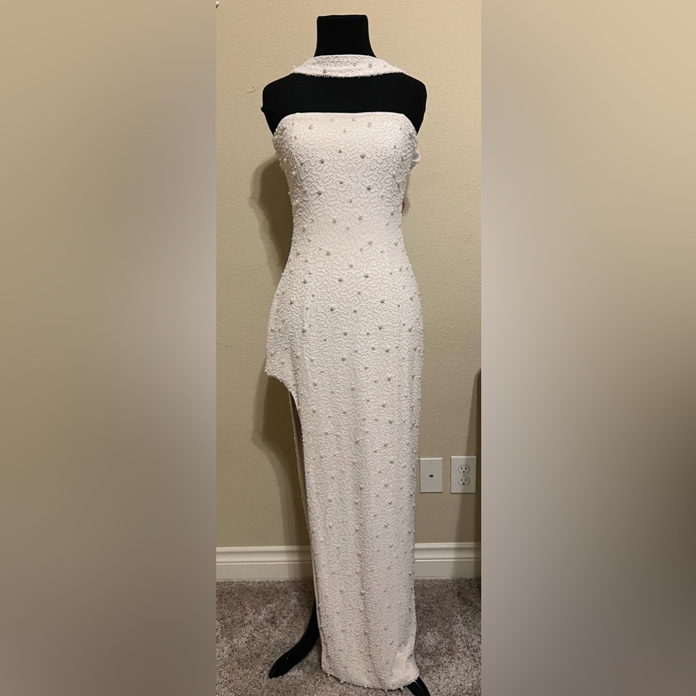 Embellished Bandeau
Maxi Dress in Ivory. Hand sewn pearl and bead.